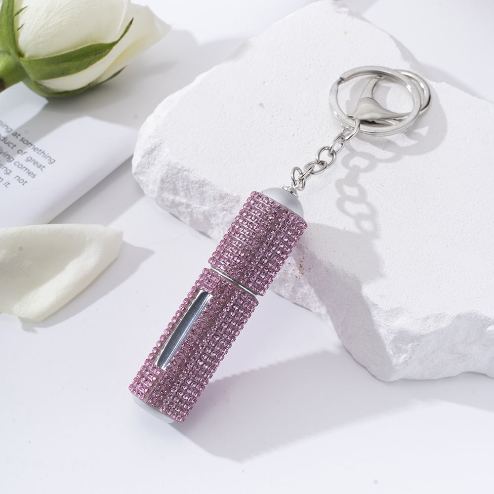 Wholesale  diamond-studded creative perfume bottle keychain is easy to carry
